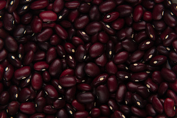 Red kidney beans closeup top view background. Healthy protein food.