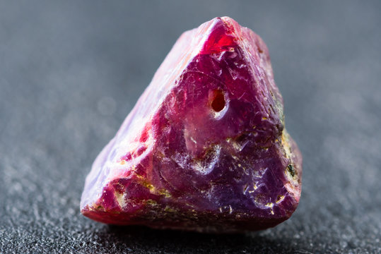 Uncut and rough natural red spinel crystal.