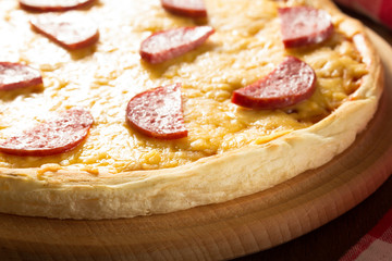 pepperoni pizza at wood