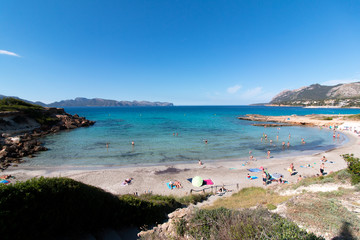 Fototapeta na wymiar Mallorca beach with turquoise water and bright blue sky