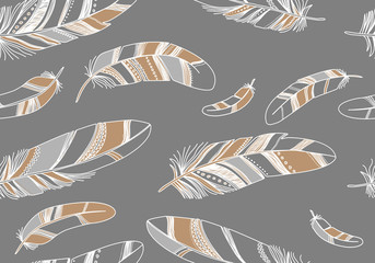 Seamless pattern with beige feathers on a gray background.