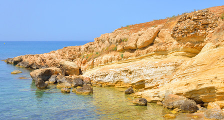 Fototapeta na wymiar Rocks on the coast of Cretan Sea.