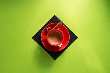 cup of coffee at colorful paper