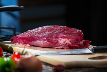 Meat and a knife before butchering