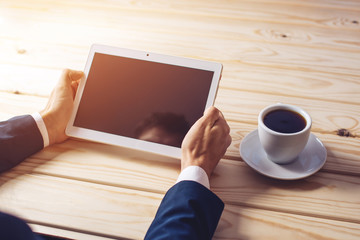man businessman in suit using a digital tablet