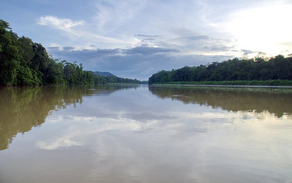 Kinabatangan, Malaysia - 09 May 2013 : Tourists on a boat cruise along the river of Kinabatangan, some of the most diverse concentration of wildlife in Borneo.