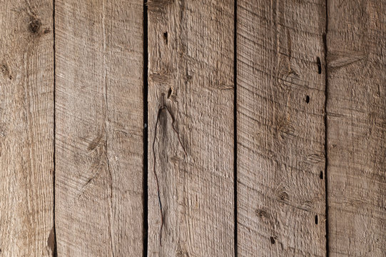 Rough wooden boards in a barn - Vertical
