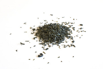 Stacks of spilled green tea leaves