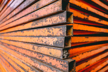 closed up stacks of rusty stainless pipe bar
