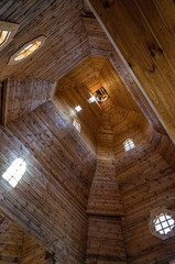 Wooden church from the inside. The dome of the ancient temple