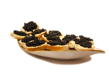Group of snacks with black caviar