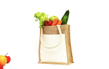 Fruits and vegetables in a shopping bag 