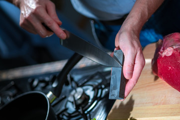 Big knife sharpening before butchering meat