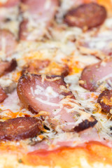 Homemade pizza with domestic sirloin