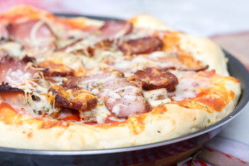 Homemade pizza with domestic sirloin