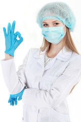 Female doctor with mask and gloves