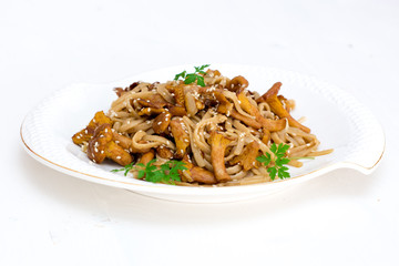 noodle with mushrooms and parsley leaves