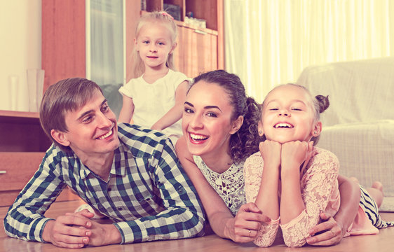 Portrait of family with kids at home