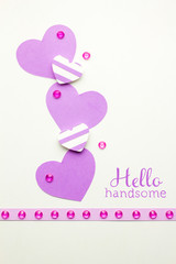Valentine card / Creative valentines concept photo of hearts made of paper on white background.