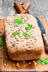 Homemade  whole rye bread with sunflower seeds and greek basil l