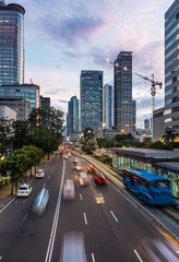Fototapeta na wymiar Traffic rushing in Jakarta business district in Indonesia capita
