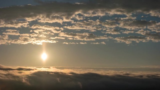 Dramatic dawn sky sunrise timelapse through flowing cloud wave, 4K Time lapse