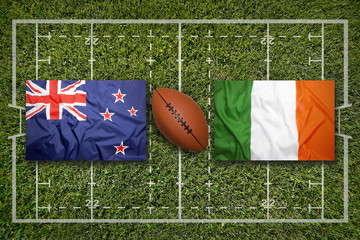 New Zealand vs. Ireland flags on rugby field