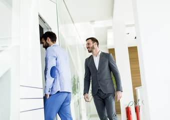 Teamwork walking in the office