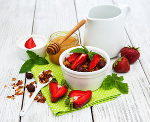 Homemade granola with strawberries