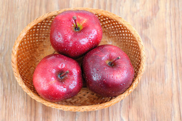 top view of a red apples with drops