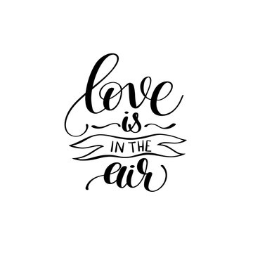 love is in the air black and white hand written lettering inscri