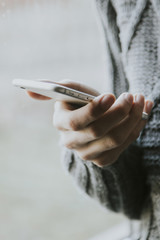 hands with the mobile phone