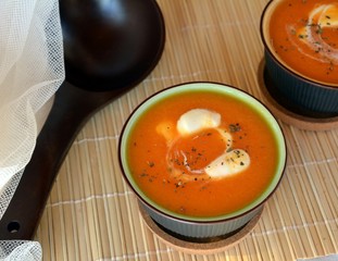 Pumpkin Creme Soup On A Bowl With Whipped Cream. Organic Vegetarian Food.