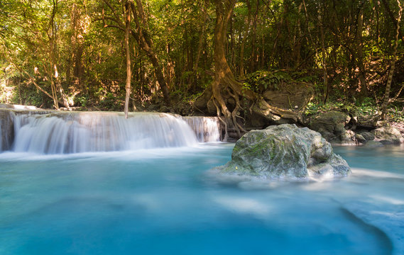 Deep forest blue stram waterfall, natural landscape background