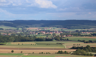 Fototapeta na wymiar Far view on Aberzhausen (front) and Alfershausen (back) from Schlossberg (Heideck)
