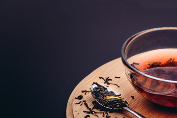 fruit tea on a bamboo plate on dark background