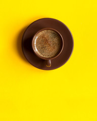 Coffee espresso cup. Yellow table - 133416536