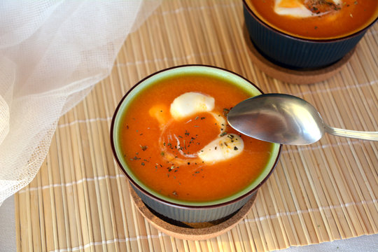 Delicious Hot Creamy Butternut Squash Soup On A Bowl. Organic Vegetarian Food.