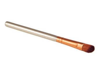 Make up brush isolated on a white background, close up