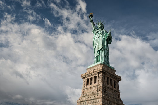 Statue of Liberty with white cloudy sky, New York