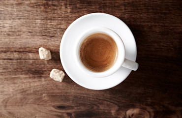 Cup of espresso on rustic wooden background

