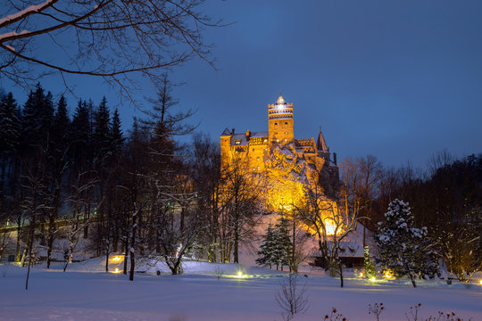 Winter view of Bran castle, also known as Dracula's castle, at blue hour