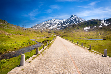 Historic Gotthard pass road with cobblestones, Alps, Italy