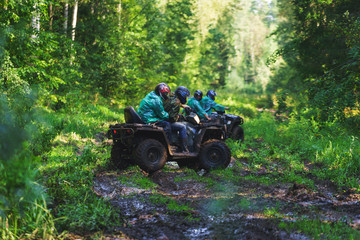 Summer Activities for adults - a trip on quad bikes on the dirty road. 