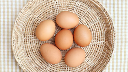 Eggs Chicken on wooden basket in the center frame 2