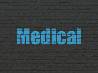 Medicine concept: Medical on wall background