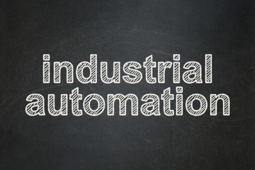 Manufacuring concept: Industrial Automation on chalkboard background