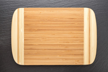wooden board on a black background