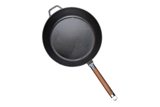 a cast-iron frying pan isolated