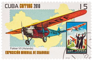Foto op Canvas Old fighter aircraft Fokker D.VII on postage stamp © Vic